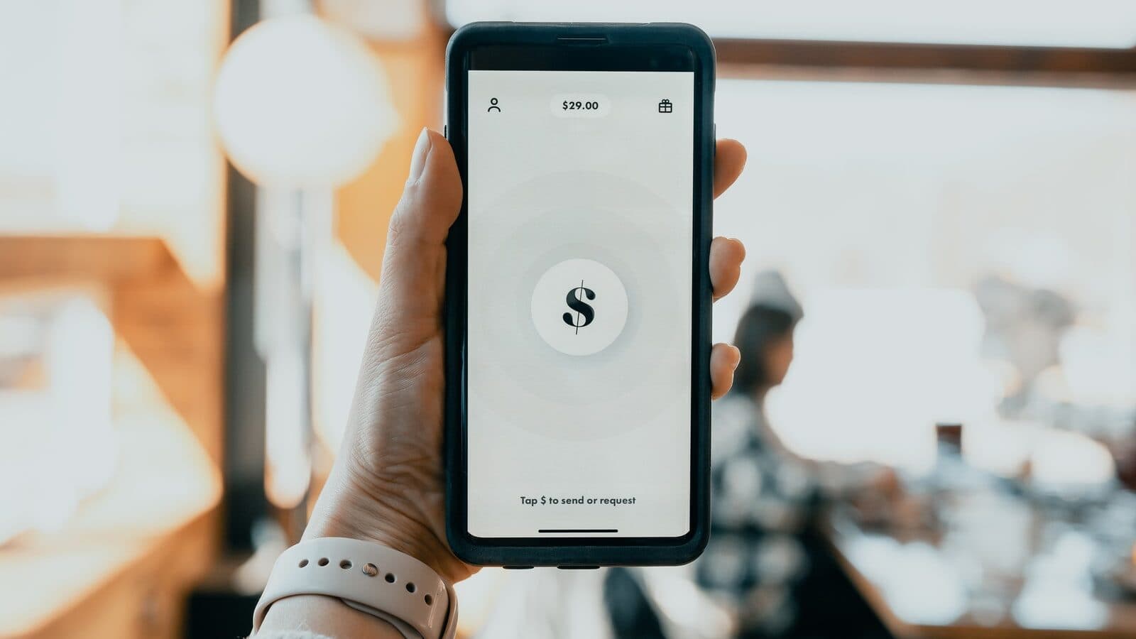 person holding black android smartphone